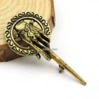 Broche de la mano del Rey